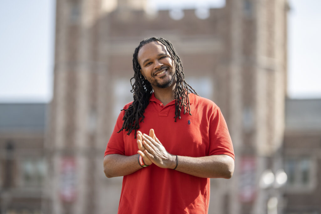 Larry Marshall, BS ’22, in front of Brookings Hall