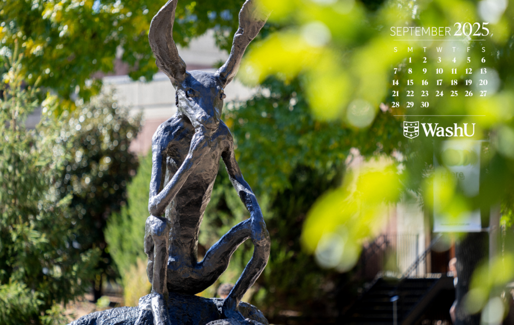 Rabbit statue with green leaves